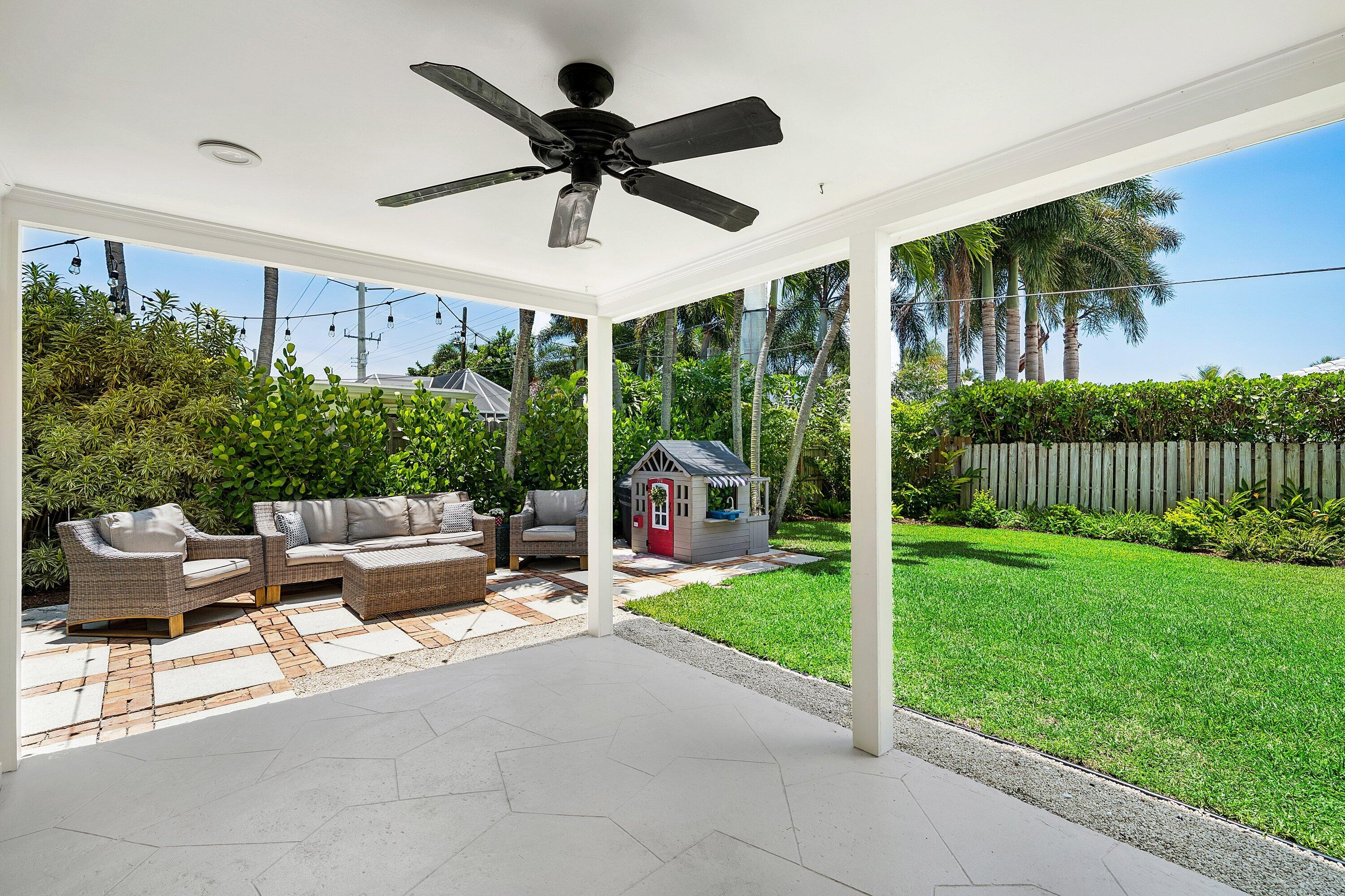 774 Southwest 7th Street Boca Raton, FL 33486 - Photo 24 of 28 a living room with patio