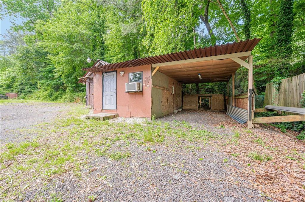 90 Valley Trail Southeast Acworth, GA 30101 - Photo 24 of 28 a backyard of a house with lots of green space