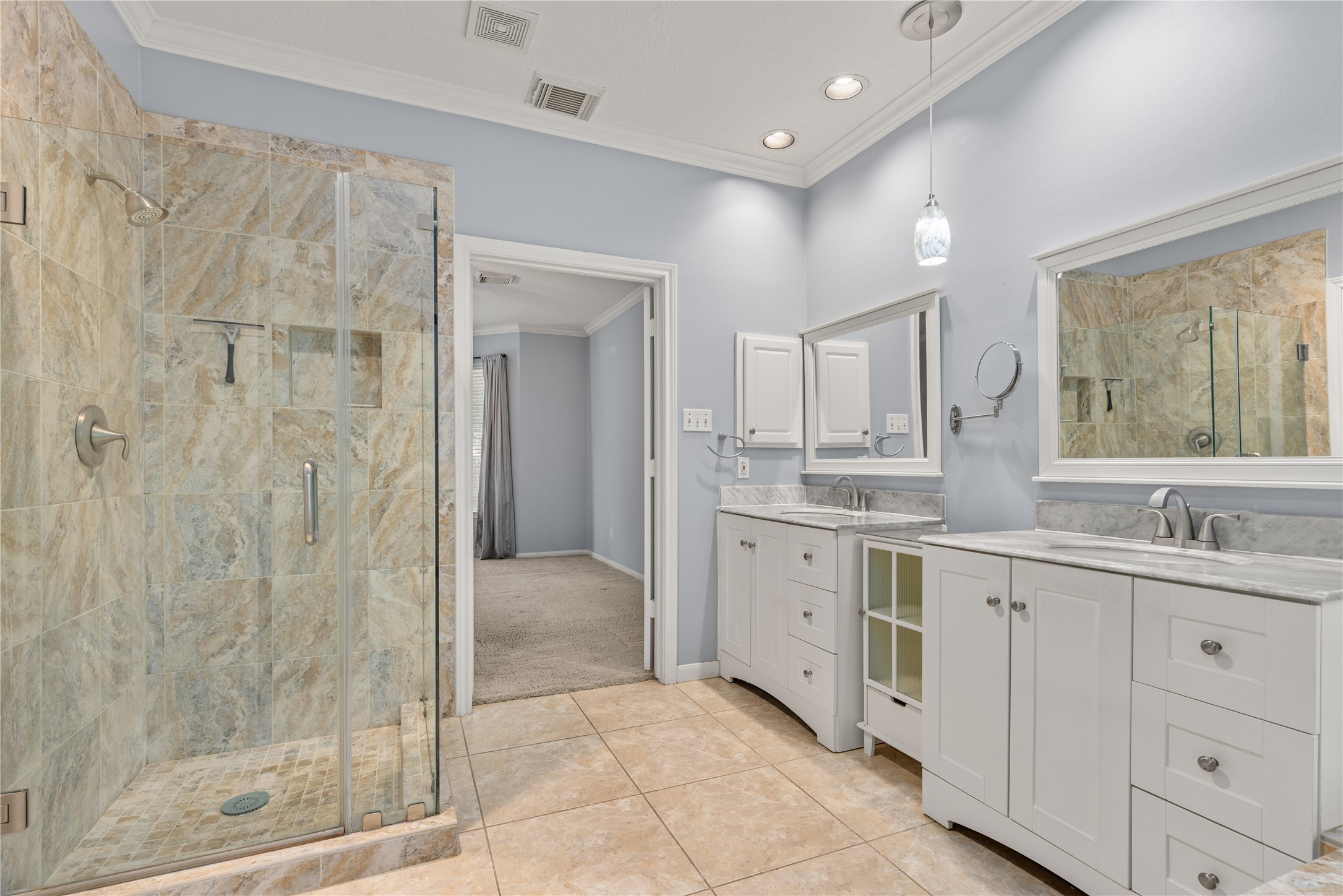 20823 Water Point Trail Humble, TX 77346 - Photo 21 of 43 a bathroom with a granite countertop sink a mirror and a shower