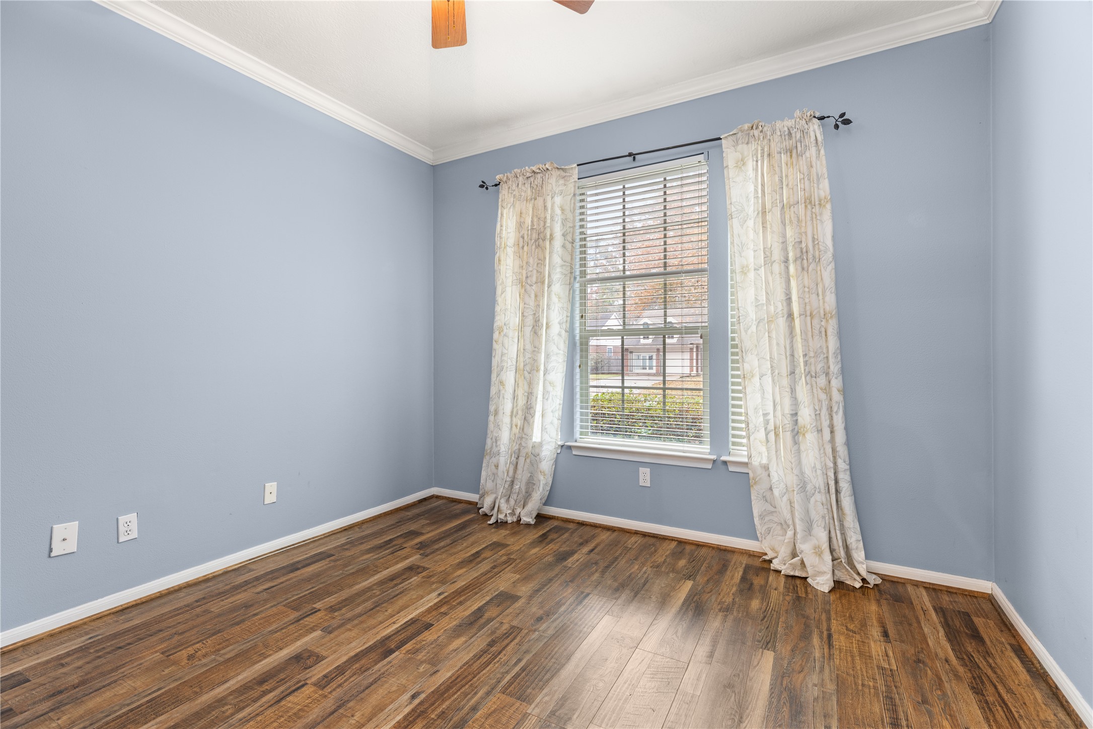 20823 Water Point Trail Humble, TX 77346 - Photo 24 of 43 an empty room with wooden floor and windows