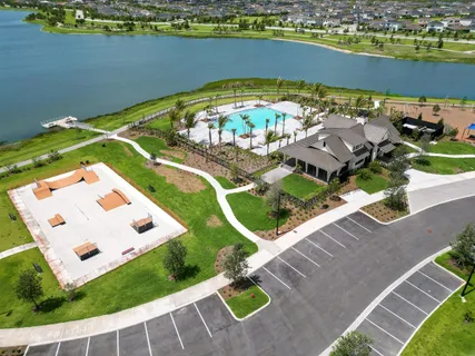 an aerial view of a house with a ocean view
