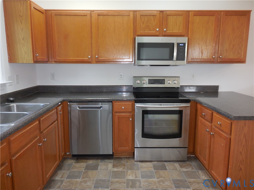 1781 Rolling Path Road Mineral, VA 23117 - Photo 3 of 23 Kitchen featuring light wood cabinetry, dark speck
