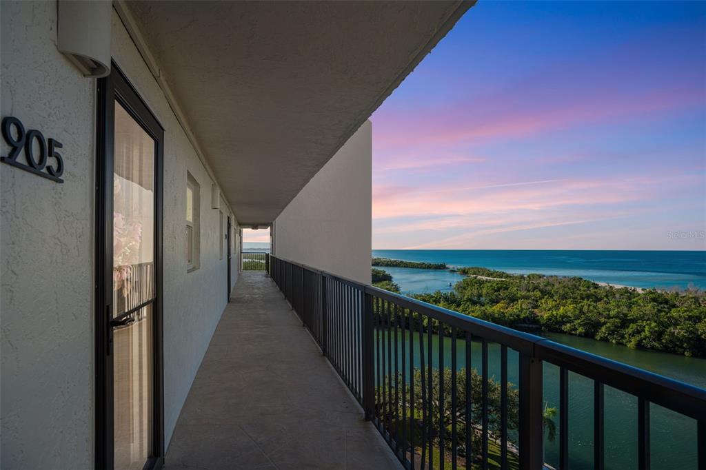 9397 Midnight Pass Road, Unit 905 Sarasota, FL 34242 - Photo 16 of 37 a view of city from balcony