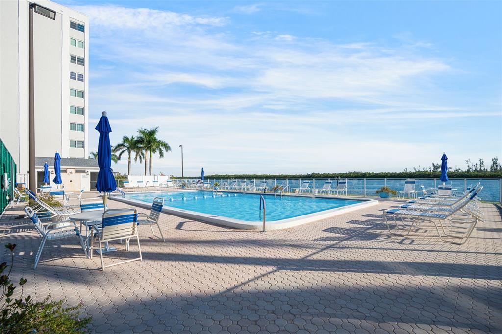 9397 Midnight Pass Road, Unit 905 Sarasota, FL 34242 - Photo 19 of 37 a view of ocean with a terrace