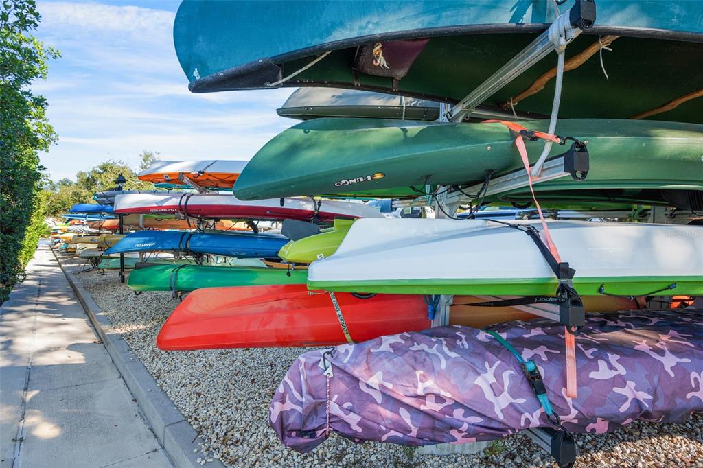9397 Midnight Pass Road, Unit 905 Sarasota, FL 34242 - Photo 21 of 37 a view of a backyard with sitting area