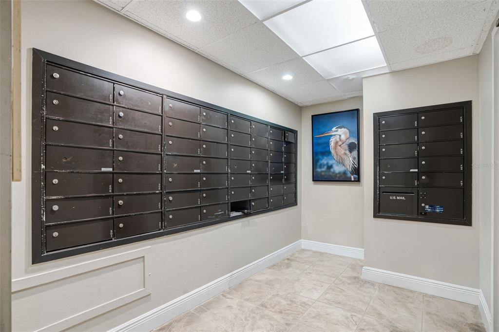 9397 Midnight Pass Road, Unit 905 Sarasota, FL 34242 - Photo 28 of 37 a view of an empty walk in closet