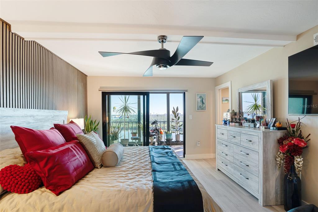 9397 Midnight Pass Road, Unit 905 Sarasota, FL 34242 - Photo 8 of 37 a living room with furniture and a large window