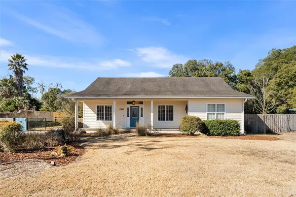 front view of a house with a patio