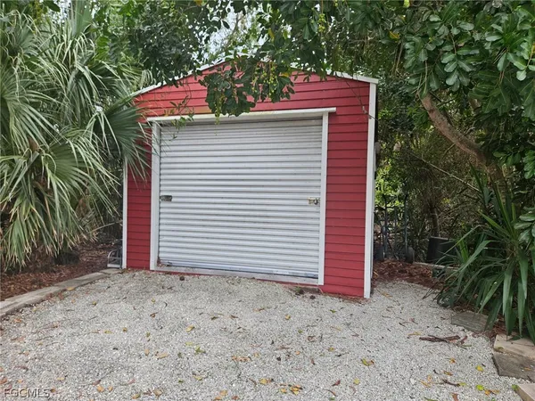 a house with trees in front of it