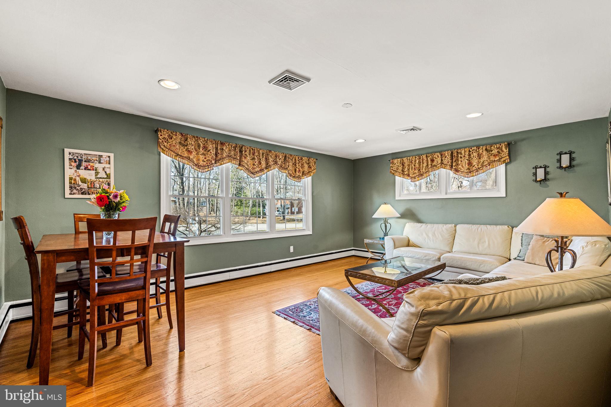 408 Scott Lane Wallingford, PA 19086 - Photo 14 of 39 a living room with furniture and a large window
