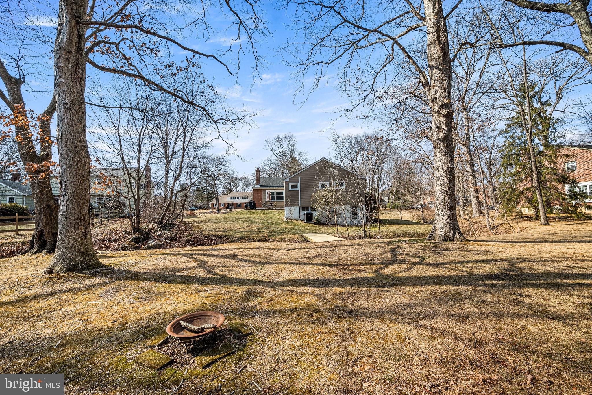408 Scott Lane Wallingford, PA 19086 - Photo 34 of 39 a view of a yard with snow on the road