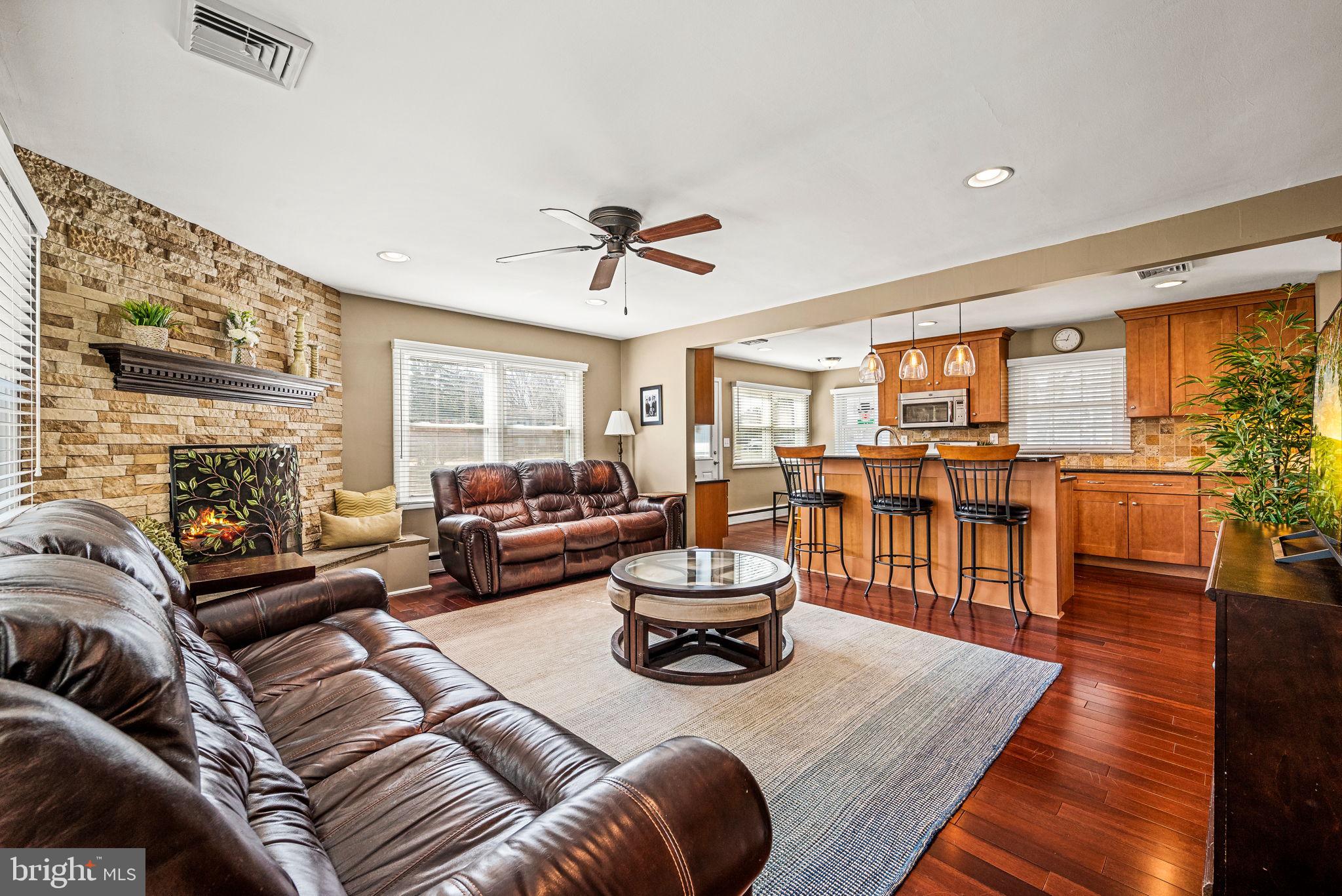 408 Scott Lane Wallingford, PA 19086 - Photo 6 of 39 a living room with furniture and a large window