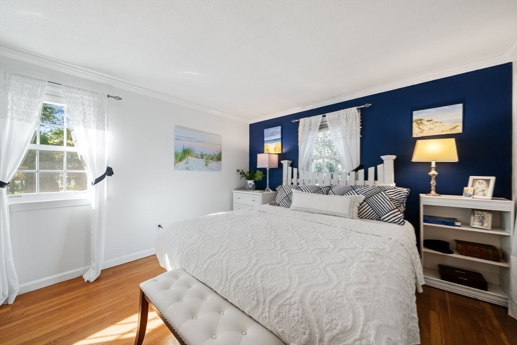43 Canterbury Road Yarmouth, MA 02675 - Photo 16 of 25 a bedroom with a bed and a window