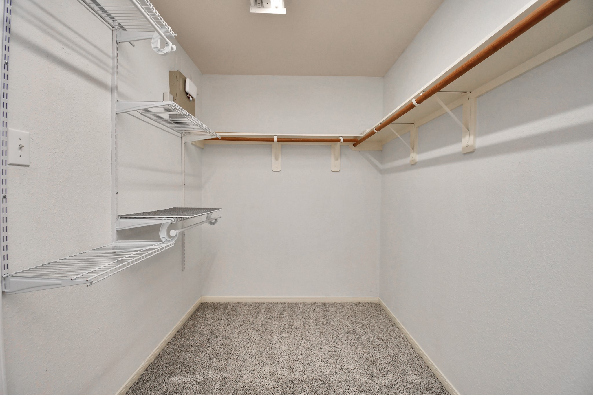 1118 Desert Palms Lane Rosenberg, TX 77471 - Photo 13 of 28 a view of walk in closet with empty racks