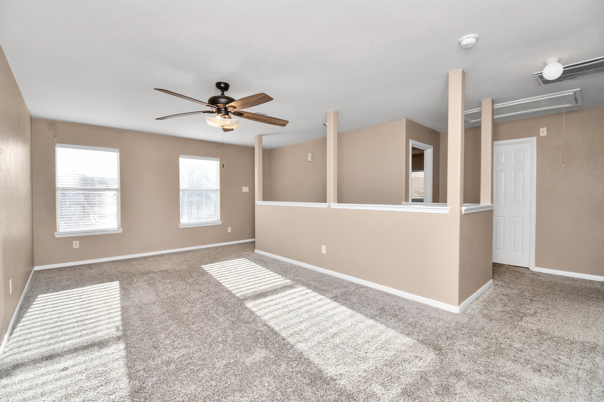 1118 Desert Palms Lane Rosenberg, TX 77471 - Photo 18 of 28 a view of an empty room with a window