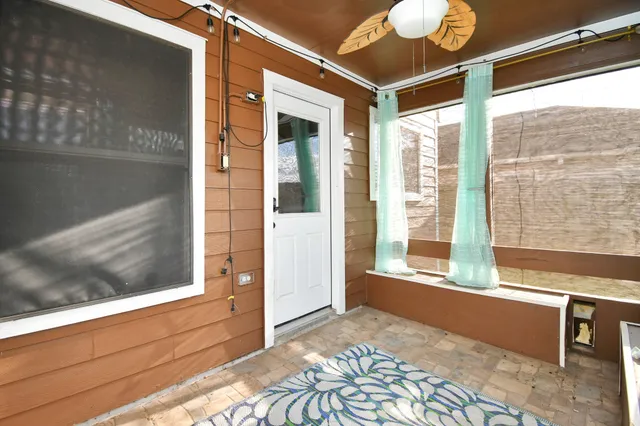 a view of a door and a window