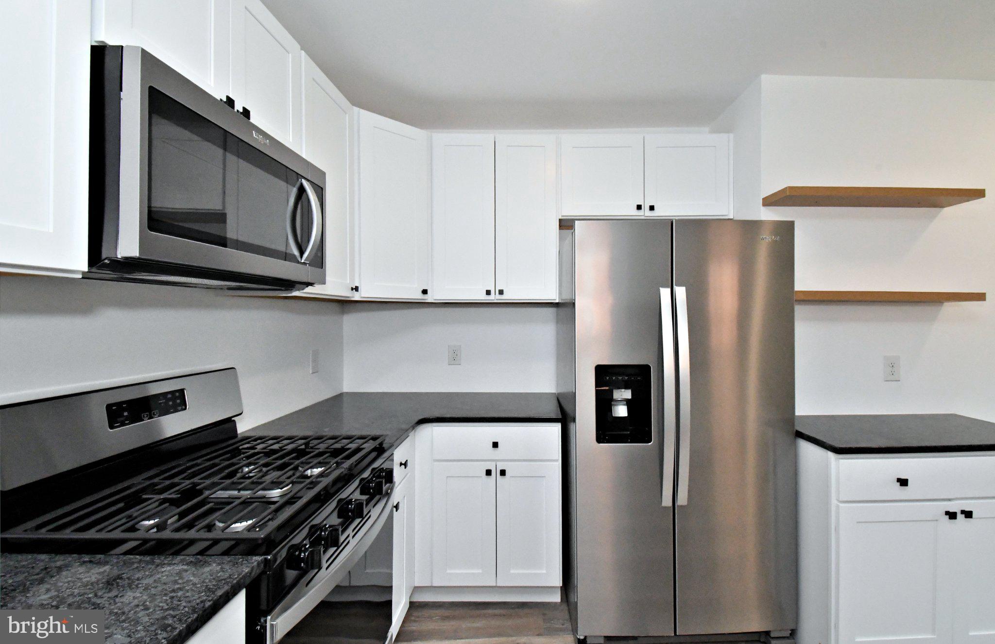 64 North Main Street Spring City, PA 19475 - Photo 8 of 26 Sleek modern kitchen with stainless steel.