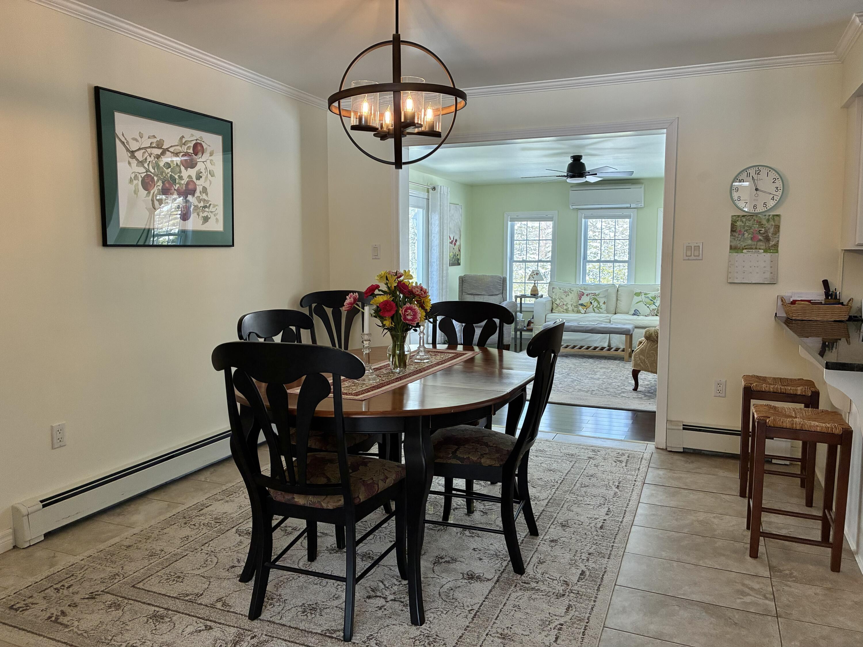 53 Sugar Way Ellsworth, ME 04605 - Photo 8 of 47 Dining room opening into sunroom.