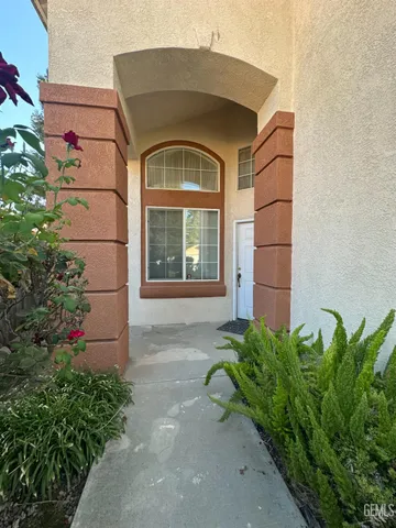 a front view of a house with a garage