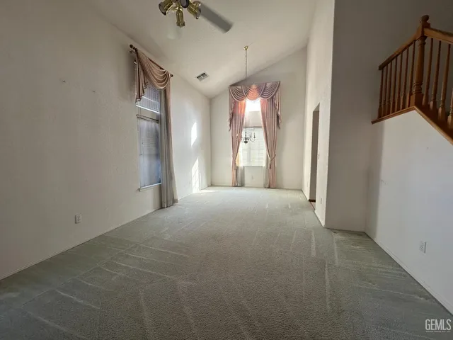 a view of a livingroom with a staircase