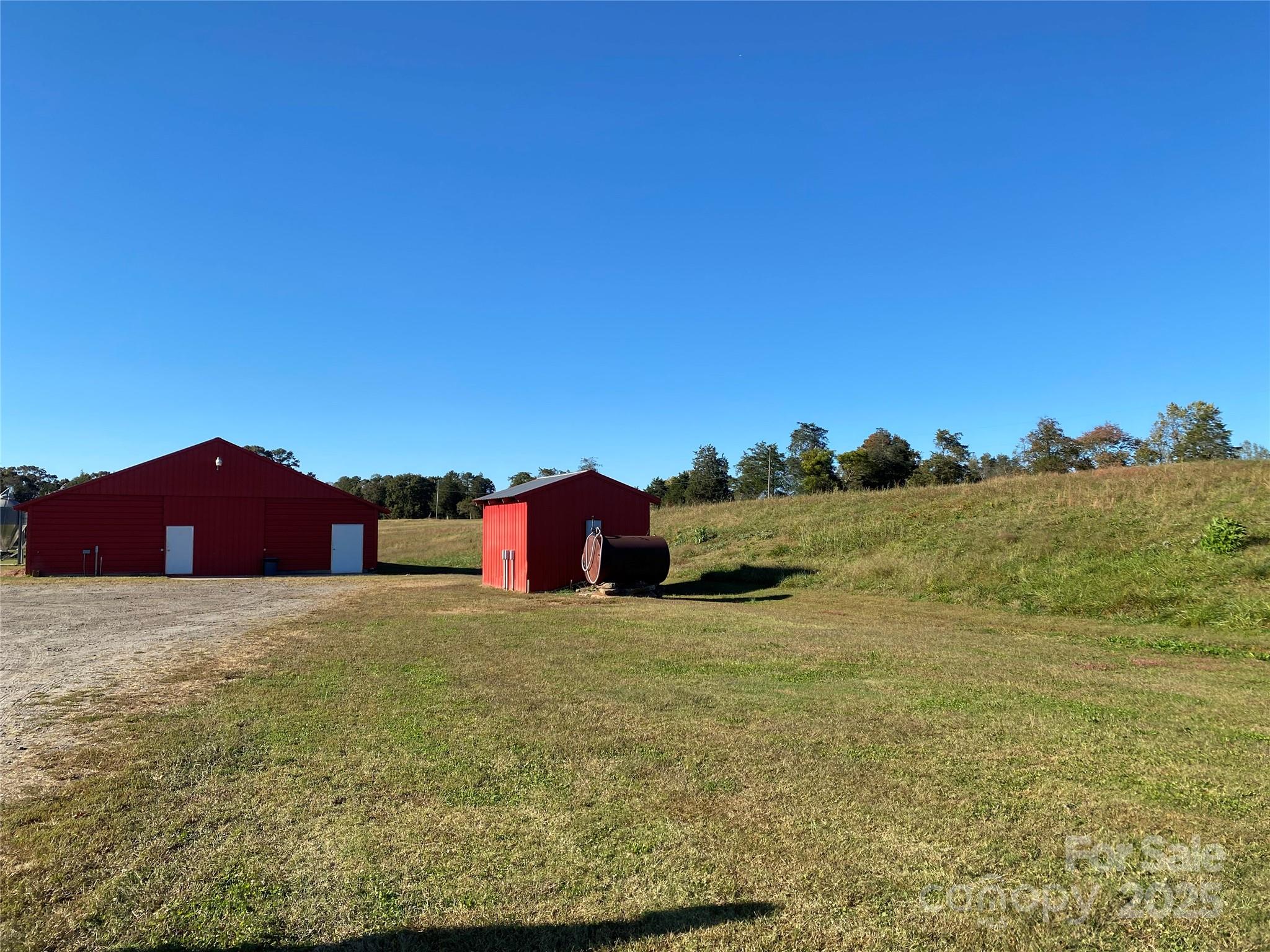 382 Poole Road Ellenboro, NC 28040 - Photo 3 of 13 a large house with a mountain in the background