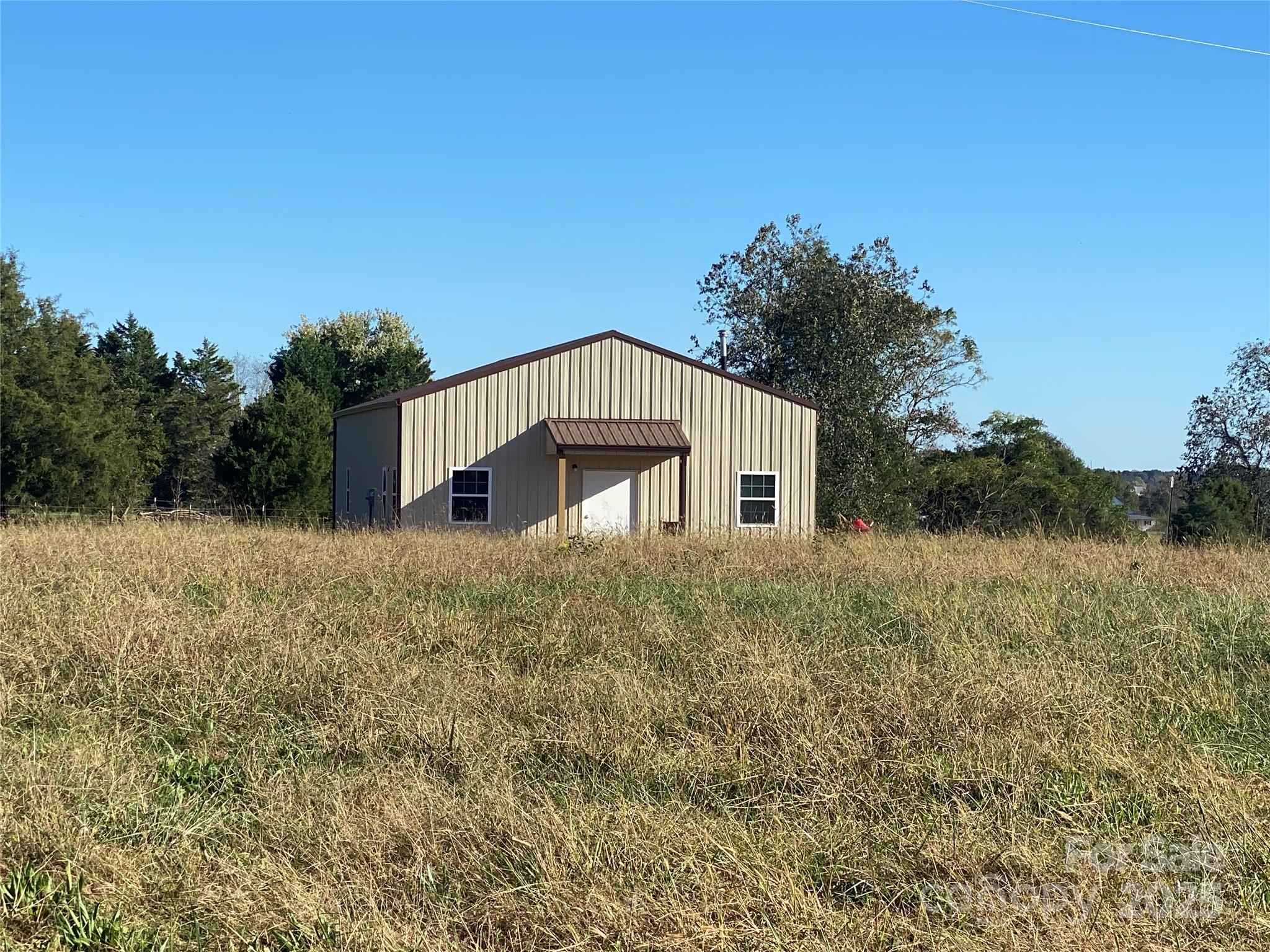 382 Poole Road Ellenboro, NC 28040 - Photo 7 of 13 a house view with a outdoor space