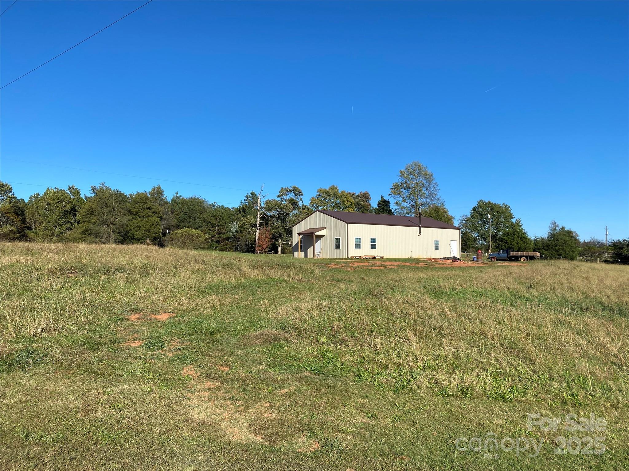 382 Poole Road Ellenboro, NC 28040 - Photo 8 of 13 a view of a field with an tree