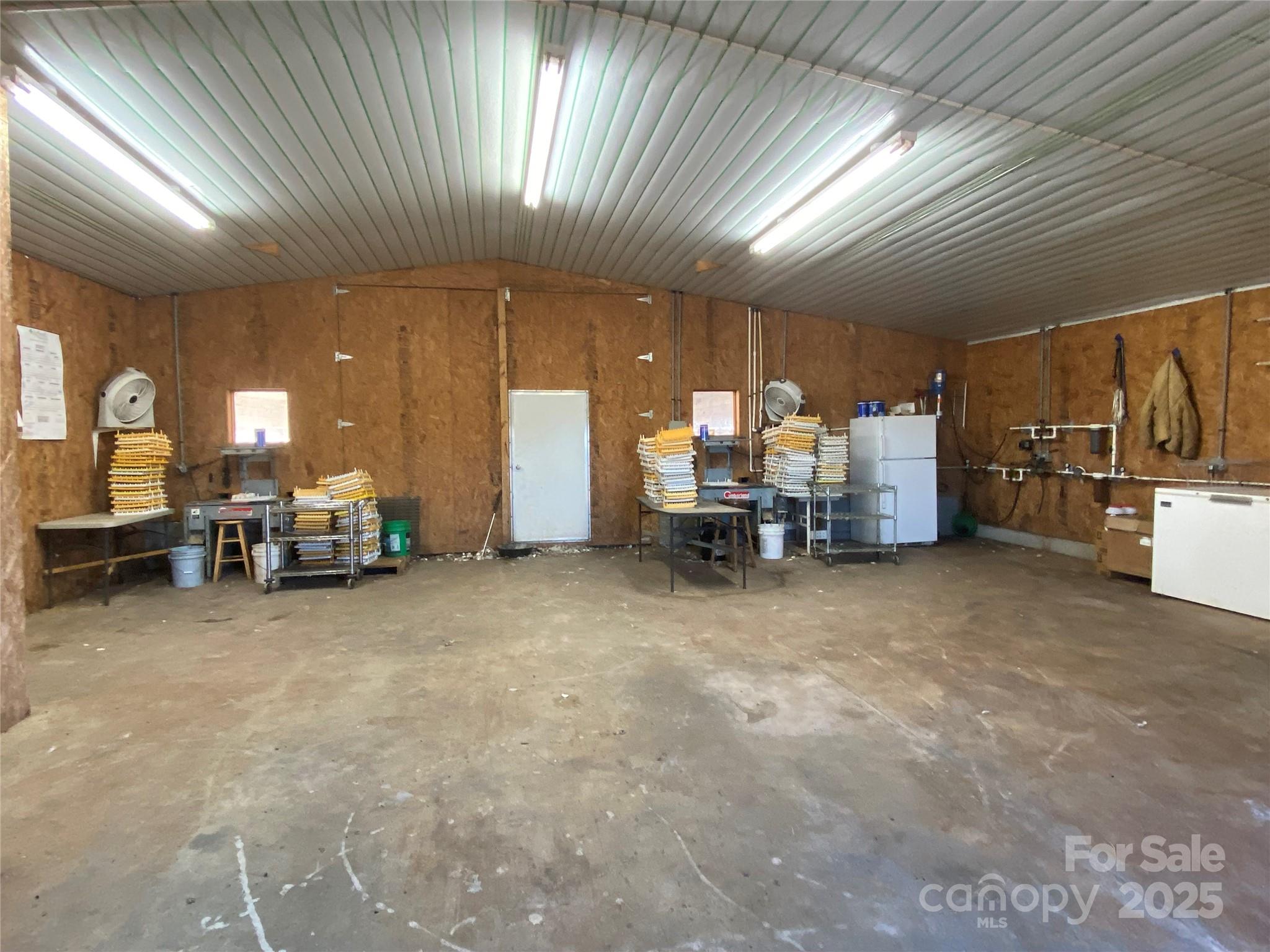 382 Poole Road Ellenboro, NC 28040 - Photo 10 of 13 a living room with furniture and a large window