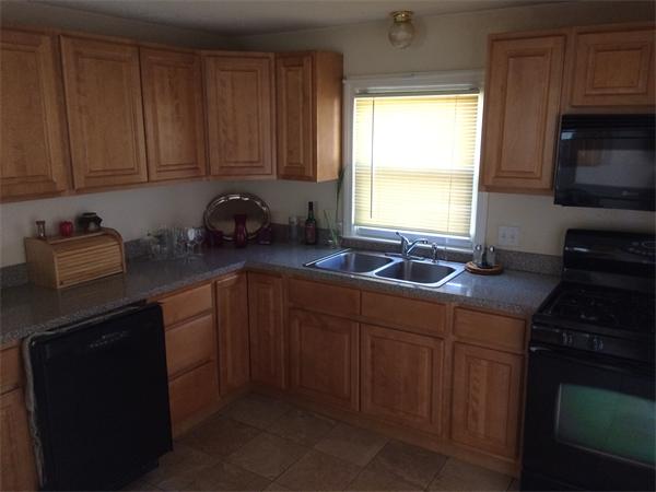 24 Spear Road Springfield, MA 01119 - Photo 4 of 12 a kitchen with a sink cabinets and window
