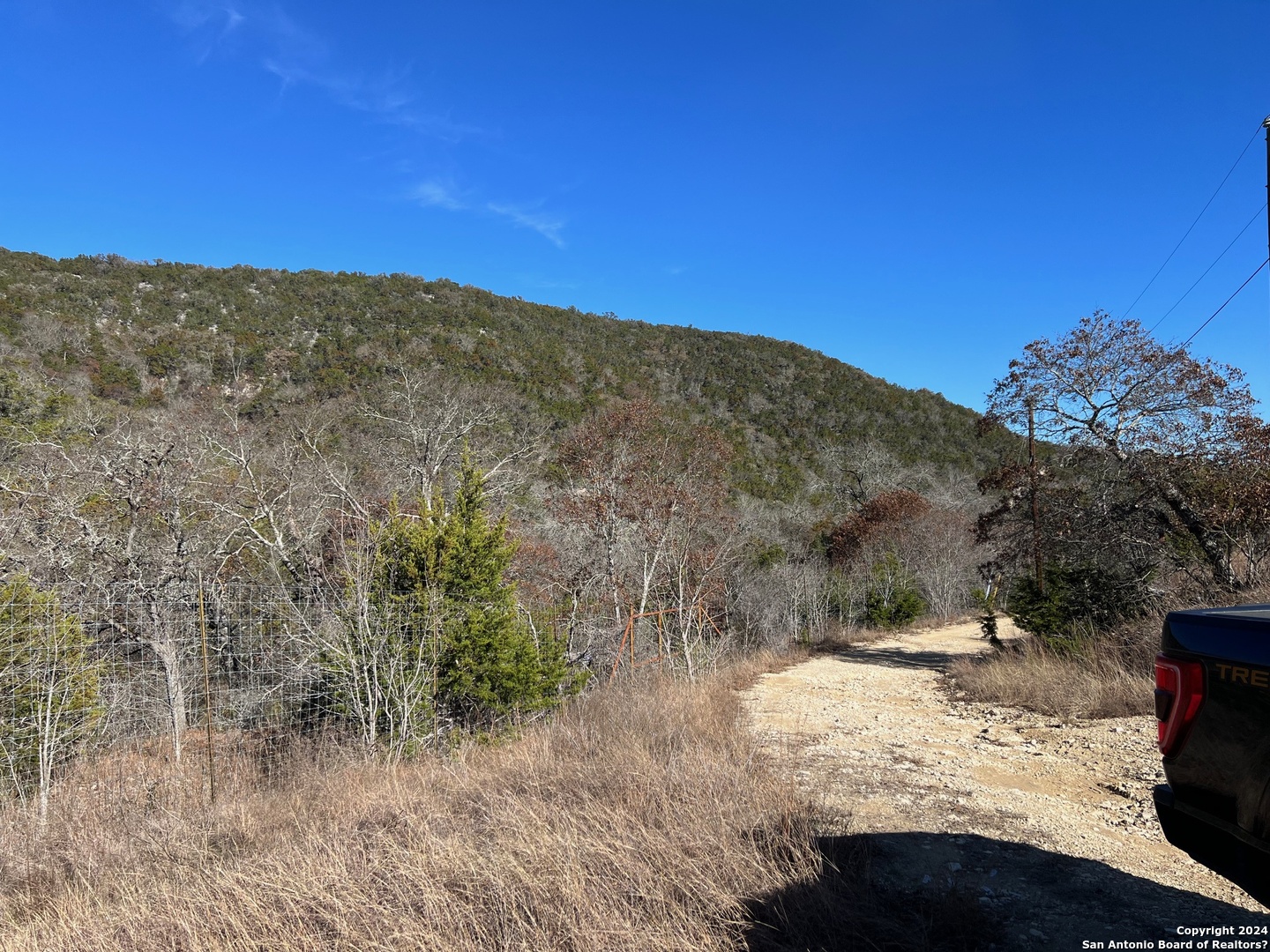 696 Chili Canyon Road Tarpley, TX 78883 - Photo 8 of 18 a view of a yard with a mountain