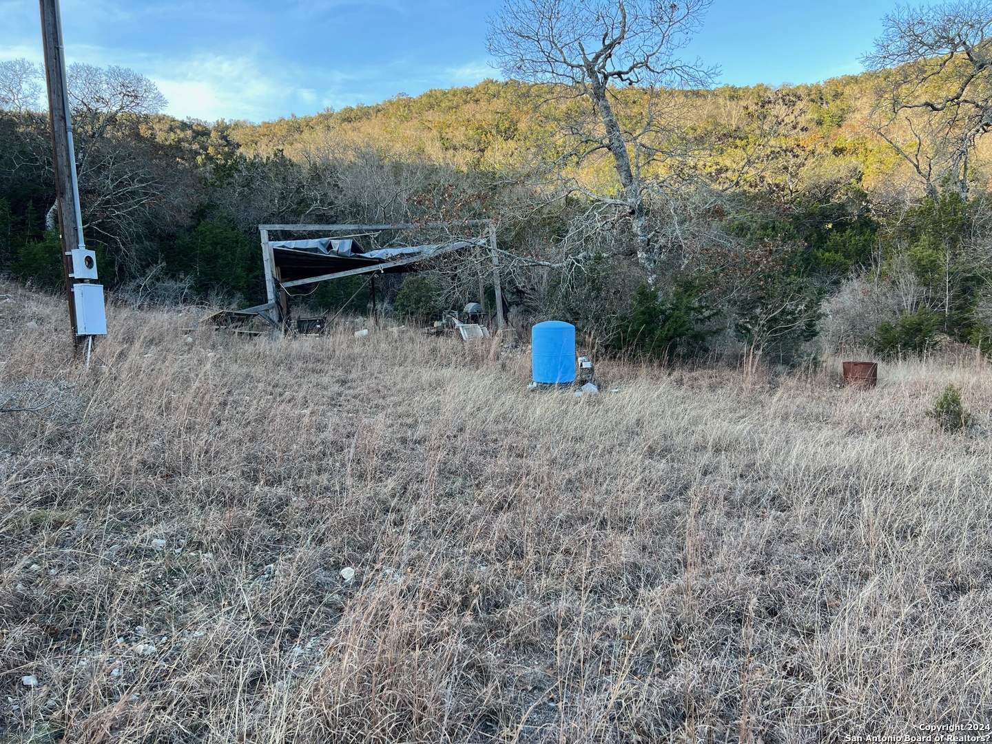 696 Chili Canyon Road Tarpley, TX 78883 - Photo 10 of 18 a view of a outdoor space with trees