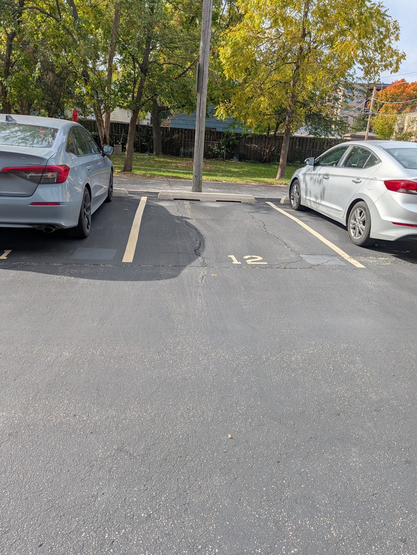 960 South River Road, Unit 208 Des Plaines, IL 60016 - Photo 11 of 11 a view of parking with cars parked