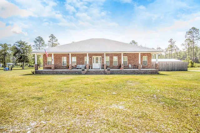 a front view of a house with swimming pool