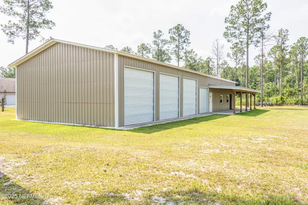 a bedroom with a bed and a cabinets