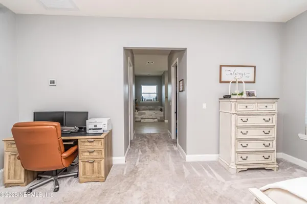 a kitchen with stainless steel appliances granite countertop a refrigerator and a stove