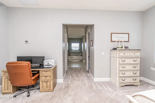 a kitchen with stainless steel appliances granite countertop a refrigerator and a stove