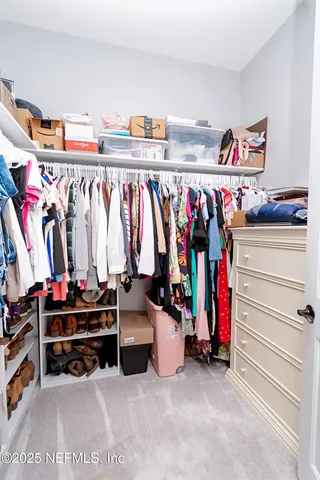 a view of a room with wooden walls