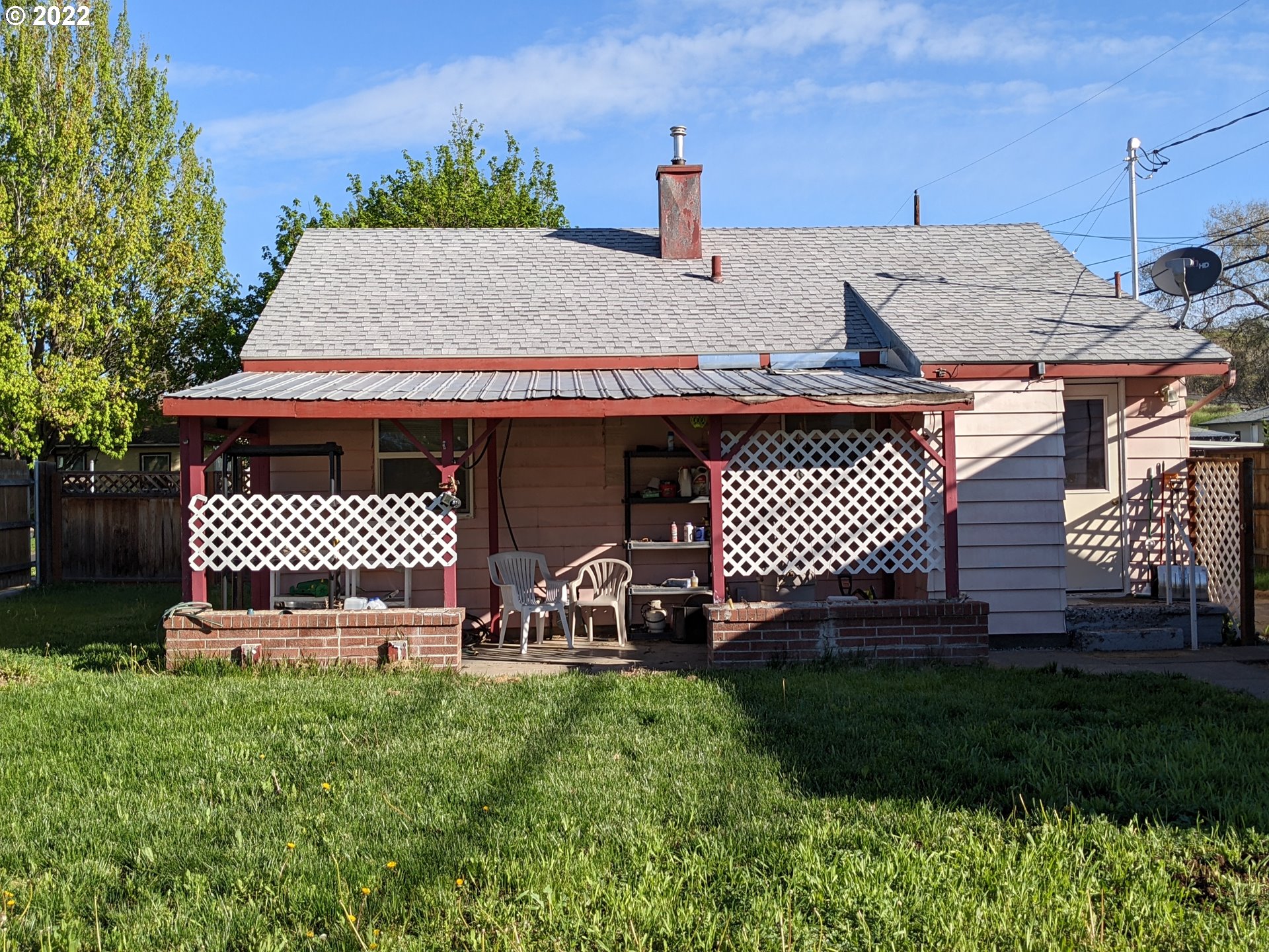 3020 Southwest Isaac Avenue Pendleton, OR 97801 - Photo 6 of 28 a view of a house with a yard and sitting area
