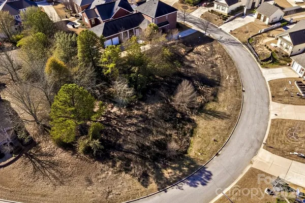 a bird view of water house with outdoor seating