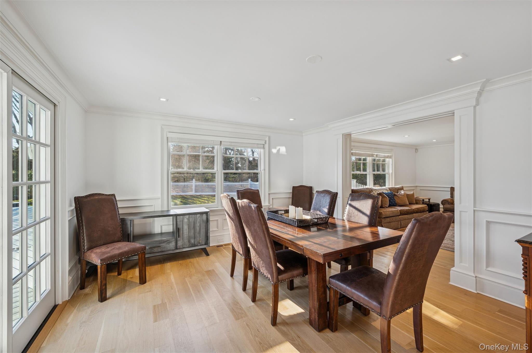 30 Club Lane Remsenburg, NY 11960 - Photo 4 of 19 a view of a dining room with furniture window and wooden floor