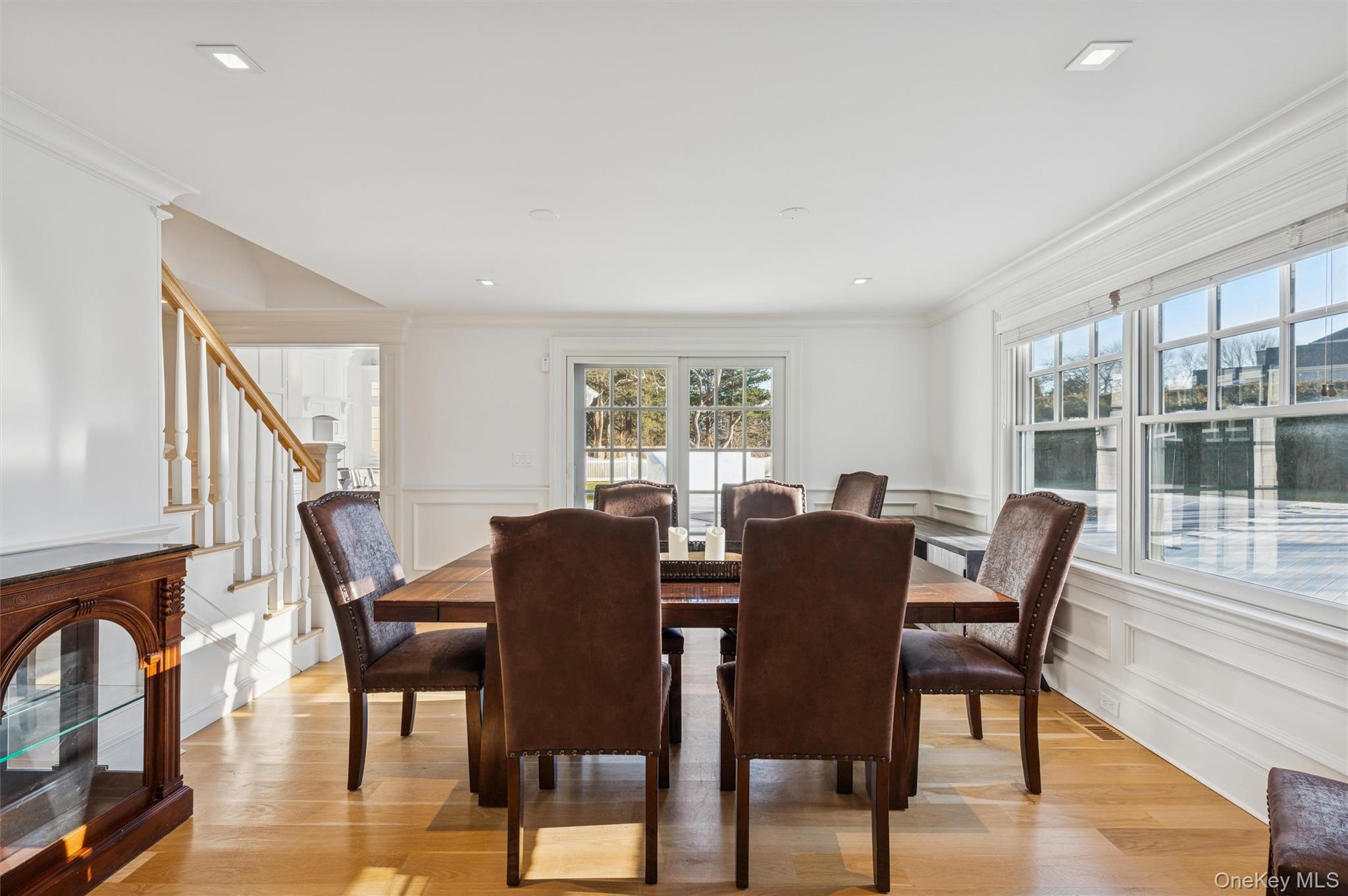 30 Club Lane Remsenburg, NY 11960 - Photo 5 of 19 a view of a dining room with furniture window and wooden floor