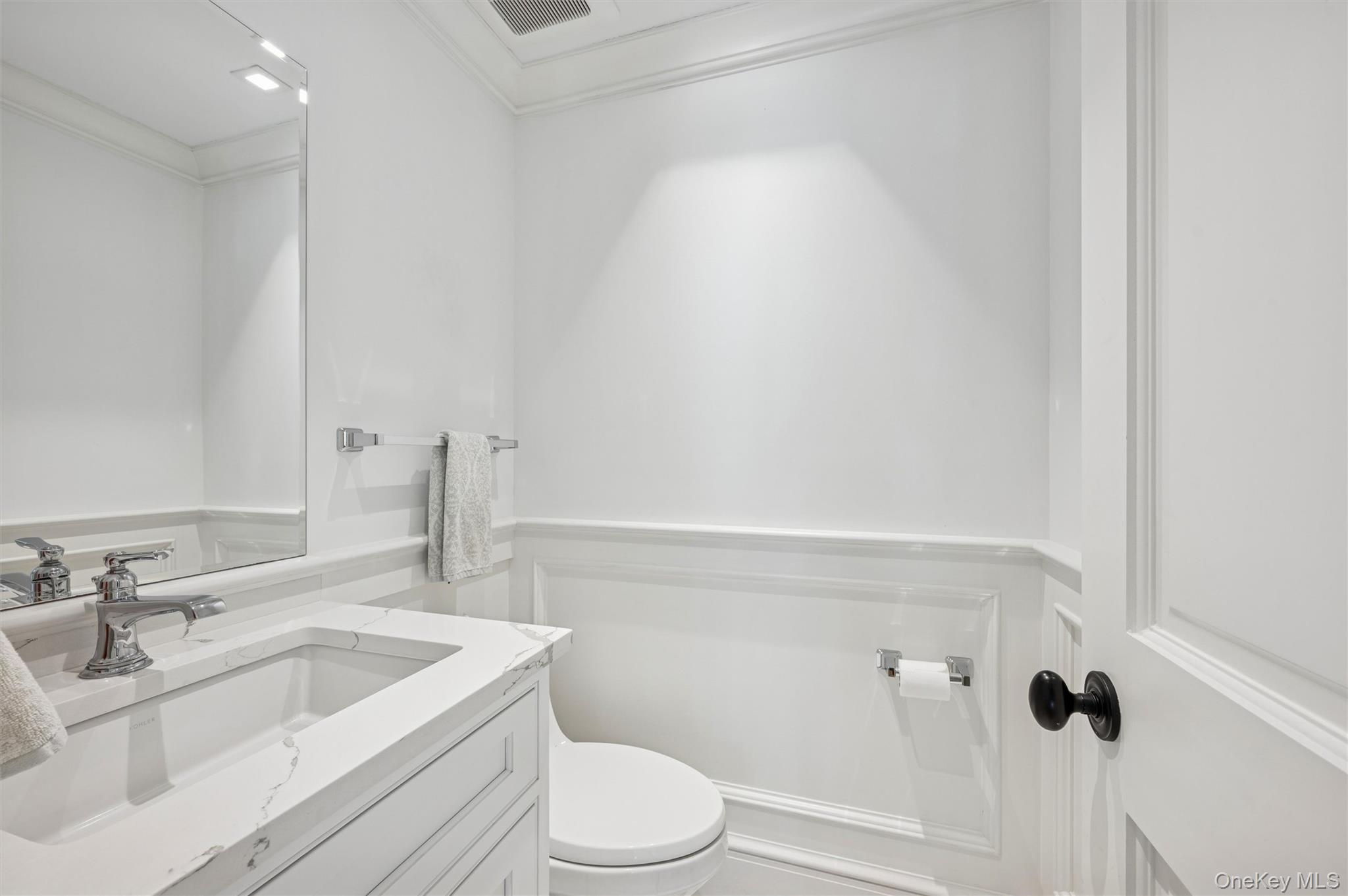 30 Club Lane Remsenburg, NY 11960 - Photo 6 of 19 a bathroom with a sink a toilet and shower