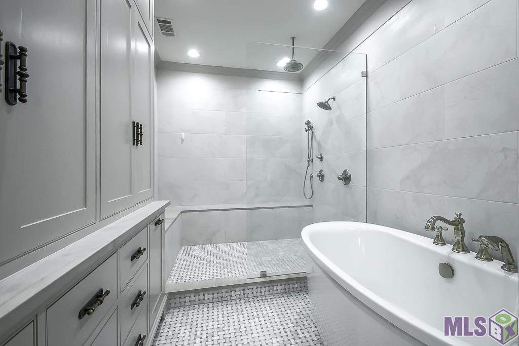 2221 Olive Street Baton Rouge, LA 70806 - Photo 18 of 33 Glass Enclosed Shower and Soaking Tub