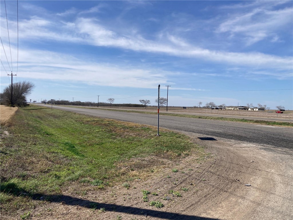 44 Highway 44 Robstown, TX 78380 - Photo 3 of 8 a view of a big yard with wooden fence