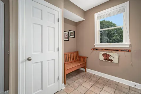 a view of an entryway with a window