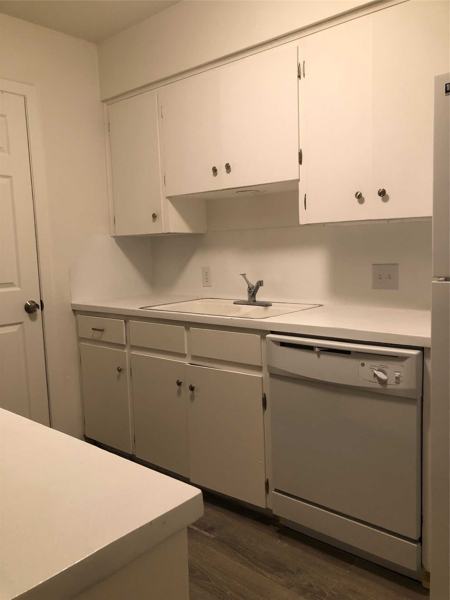 6502 South 1st Street, Unit 102 Austin, TX 78745 - Photo 9 of 26 a kitchen with appliances cabinets and a sink