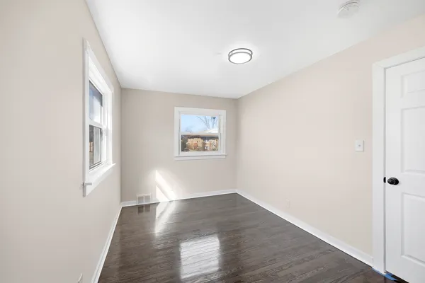 an empty room with a workspace