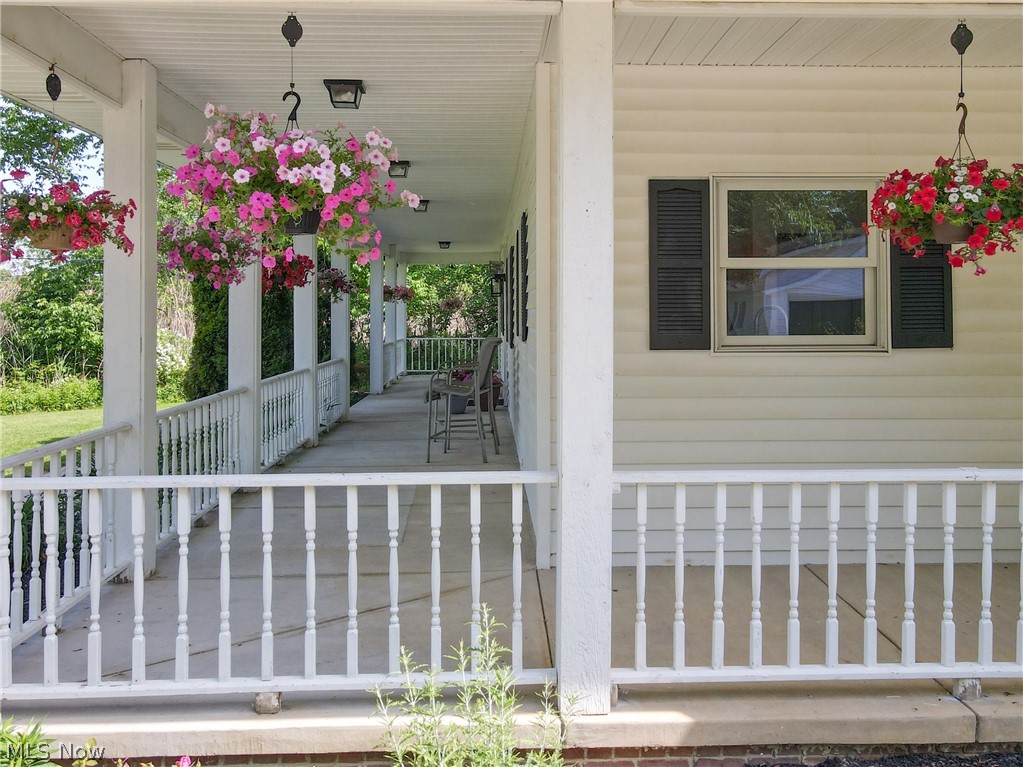 7609 Carter Road Northfield, OH 44067 - Photo 39 of 50 Covered porch offers so much space for relaxation