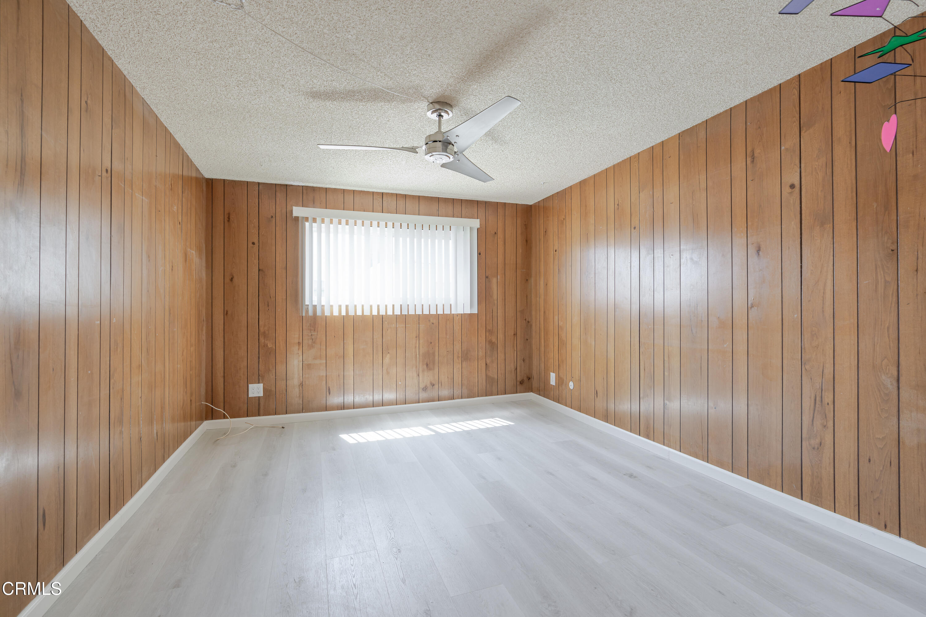 500 Jackson Place, Unit 313 Glendale, CA 91206 - Photo 12 of 19 wooden floor in an empty room with a window