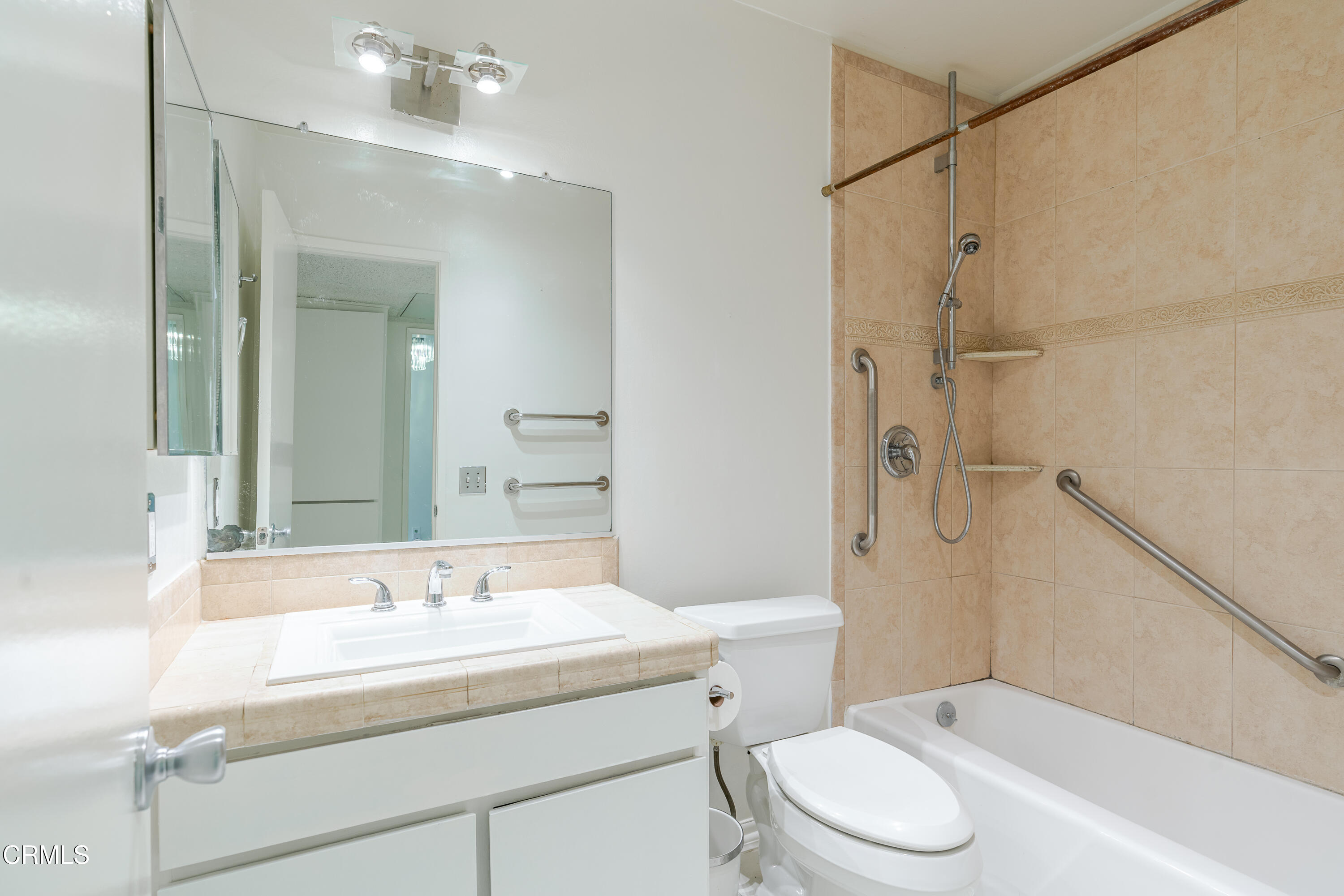 500 Jackson Place, Unit 313 Glendale, CA 91206 - Photo 13 of 19 a bathroom with a sink a toilet and shower